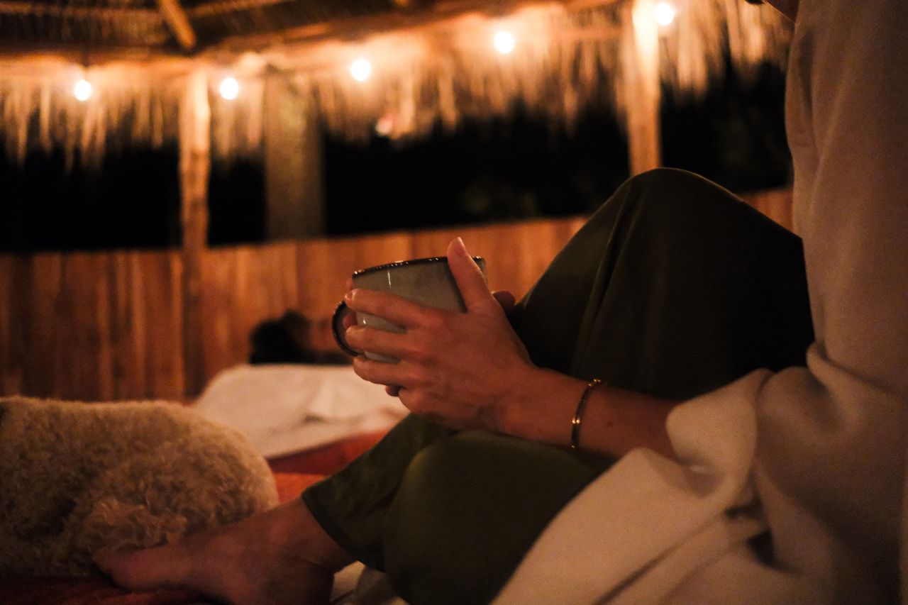 guest meditating in nature — Ananda Lodge